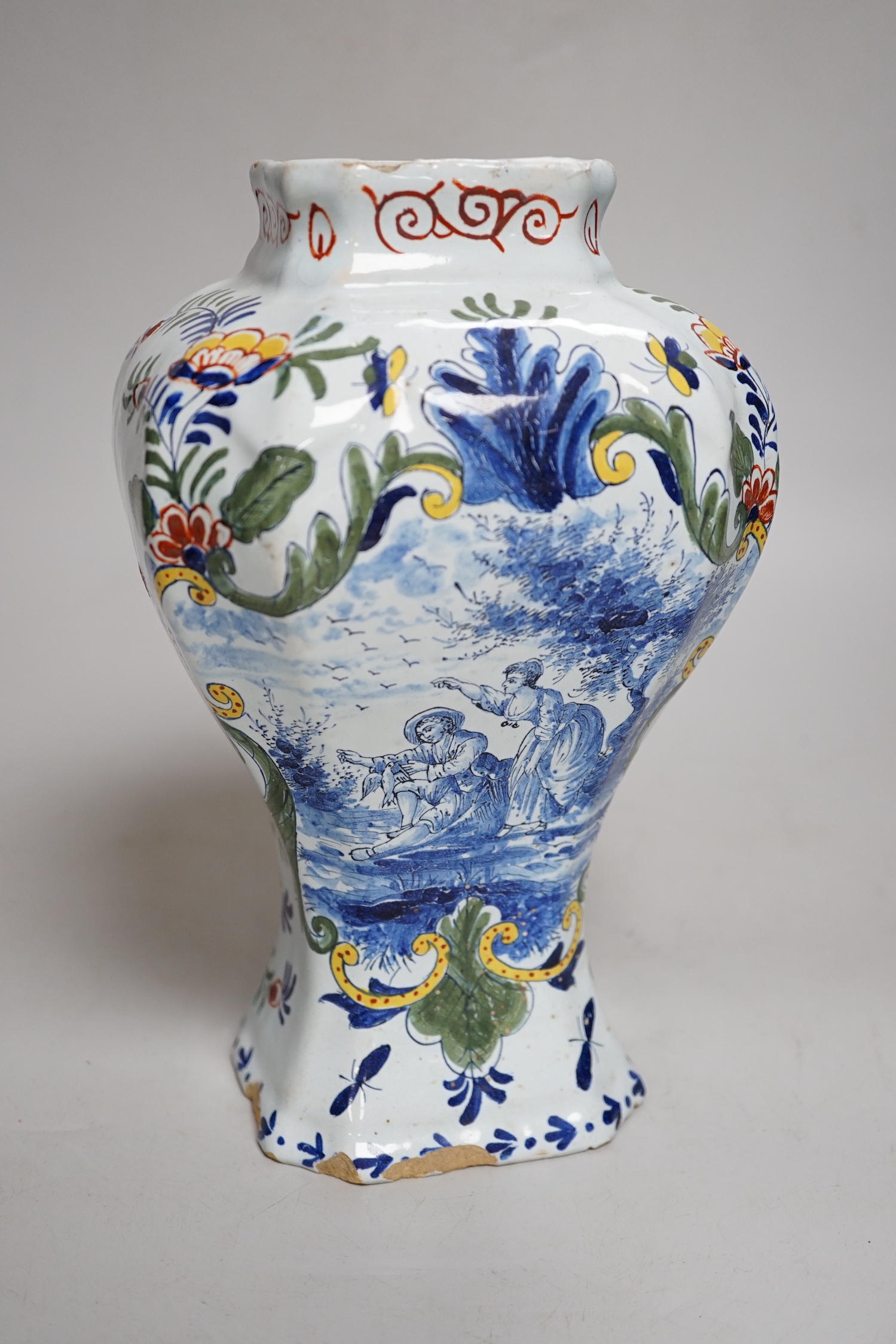 An 18th century Delft polychrome vase, 24cm high